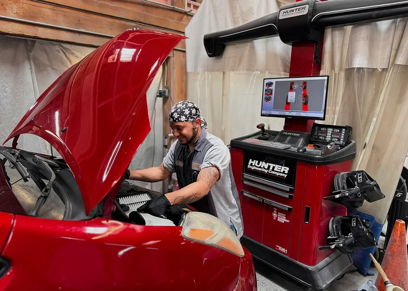 A technician at work at Auto City Repair in San Francisco